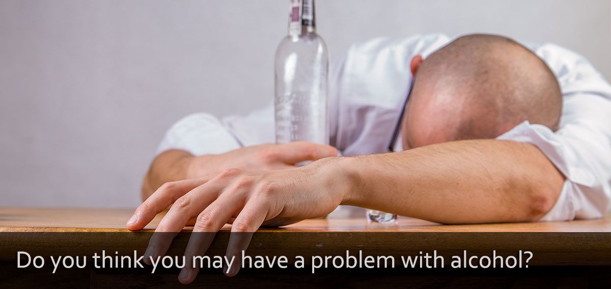 Image of man with empty bottle: Do you think you may have a problem with alcohol?